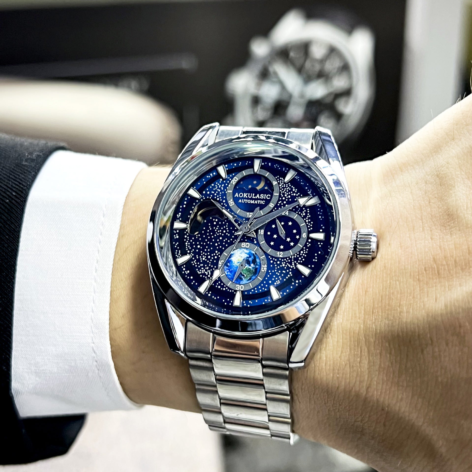 luminous mechanical watch face close up